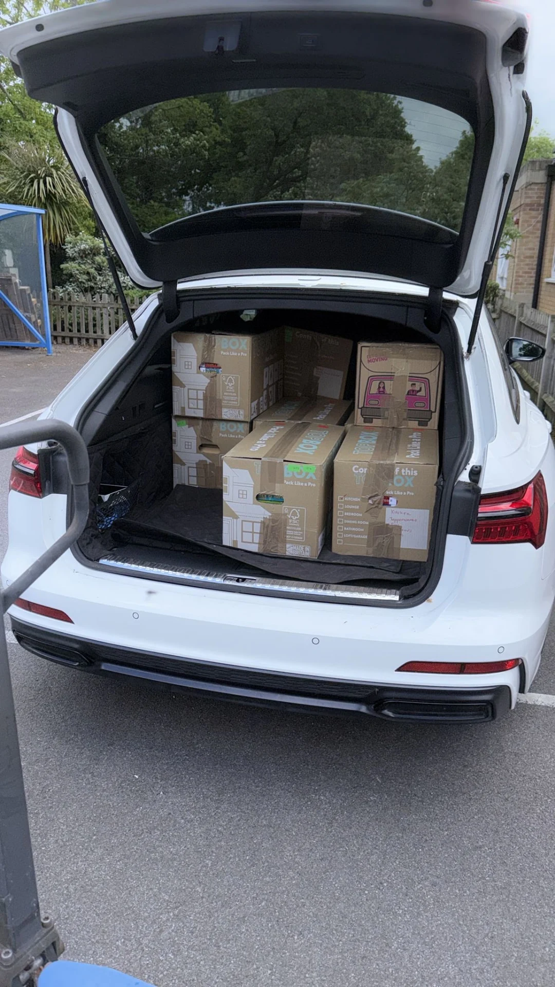 A car boot filled with boxes of donated books on their way to the new Fair Start library
